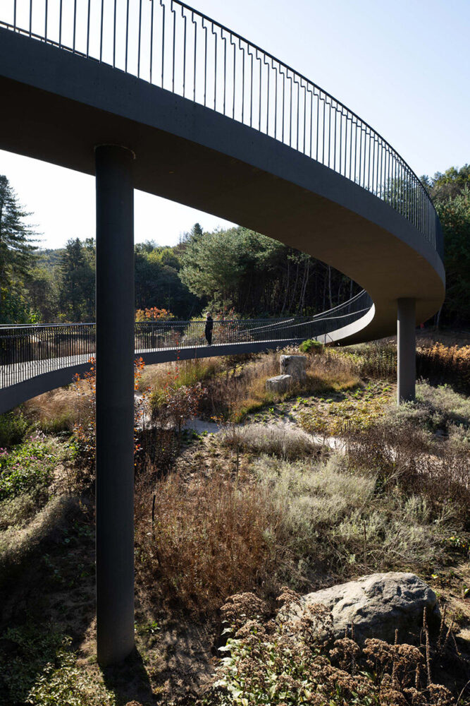 a curved ramp weaves through the landscape