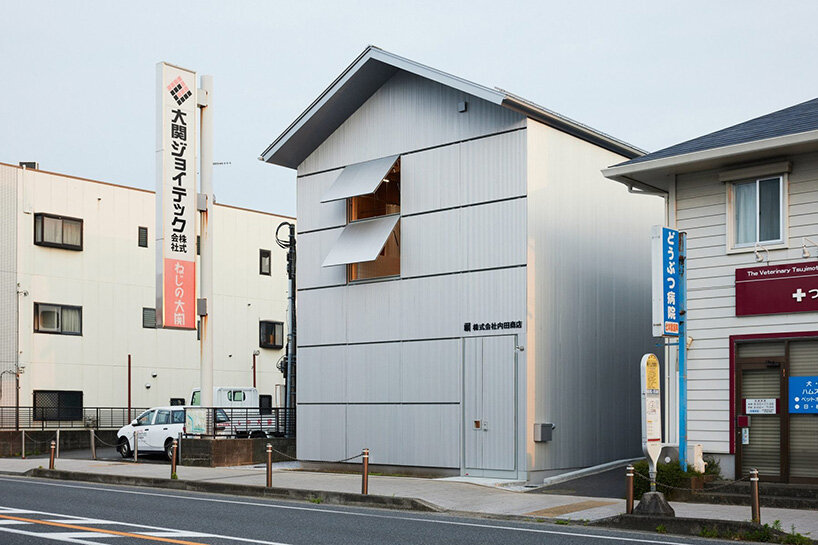 awning windows cut into the corrugated metal cladding