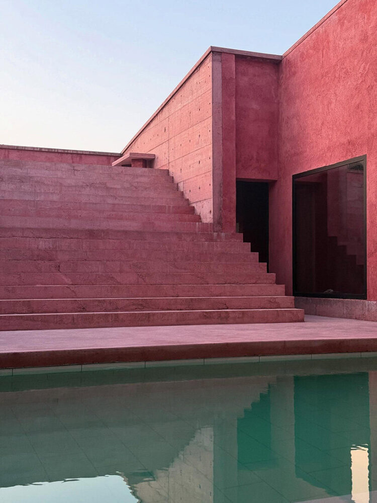 the stepped platform transforms the courtyard into a theatrical landscape
