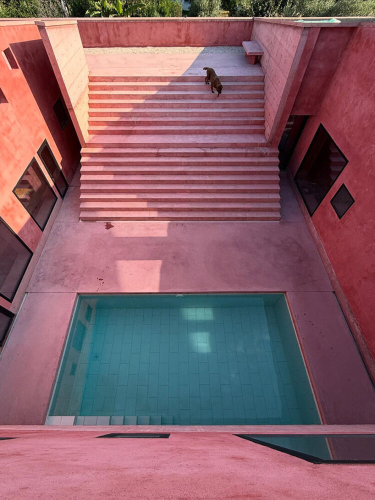the monumental stair becomes a spatial anchor within the courtyard sequence