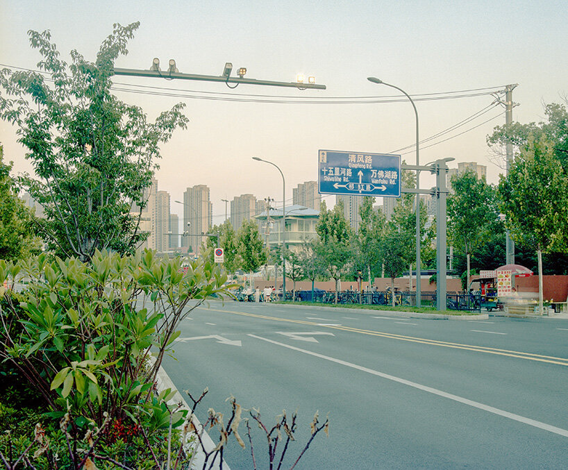 the repurposed watchtower appears along a major traffic artery at the edge of the creative park