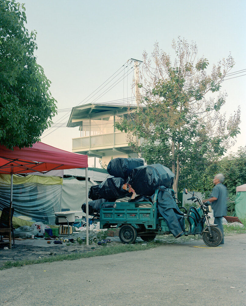 informal street activity unfolds beneath the elevated reading room