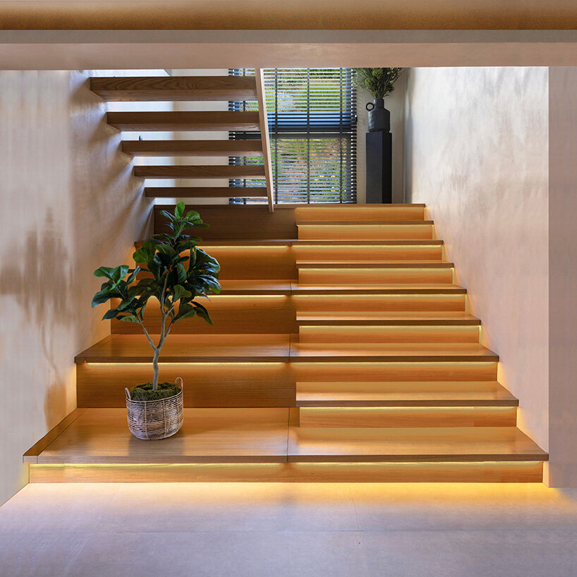 floating wooden steps with hidden storage feature warm integrated lighting