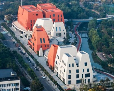 red and white geometric sports complex emerges along daixi’s riverfront