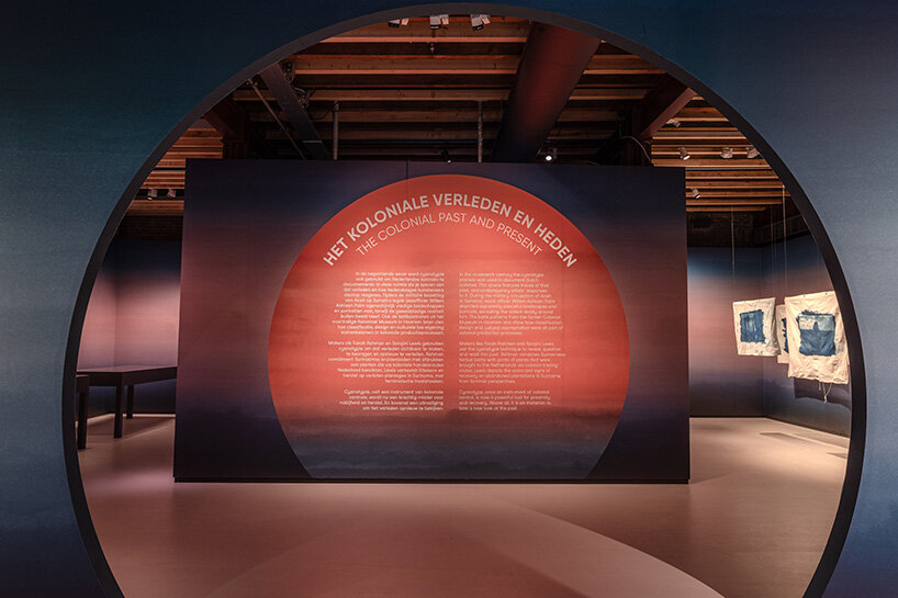 circular thresholds frame views between gallery rooms