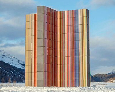 glazed color bands rise as sculptural tower in gerhard richter's alpine installation