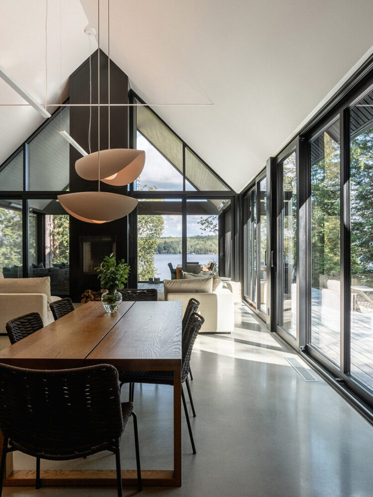 large sliding glass doors extend these spaces onto the south-facing terrace