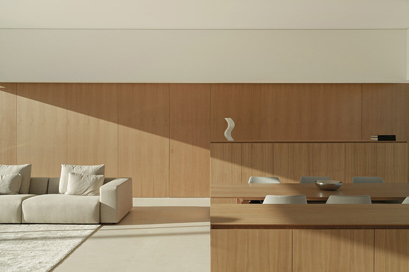 oak cabinetry and furniture define the interior