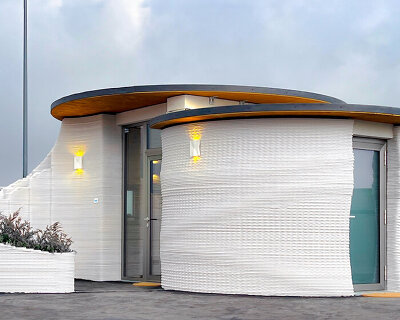 lime-based walls that can capture carbon forms first 3D printed airport building in bergamo