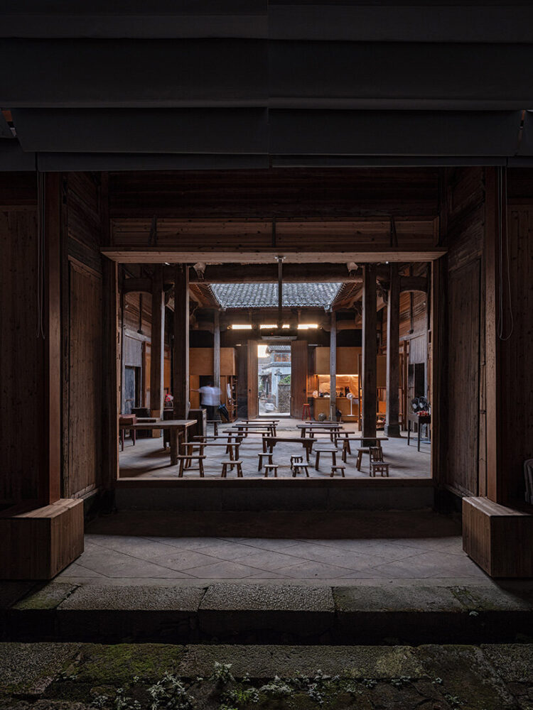 the cinema screen is framed by the ancestral hall’s original columns