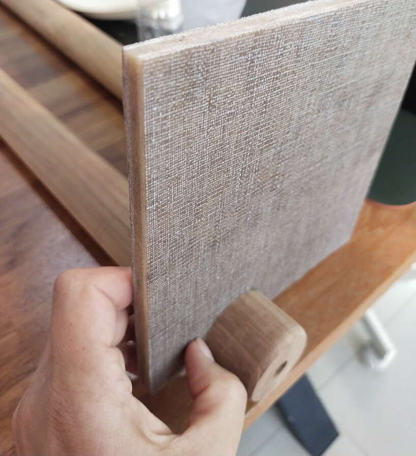 material sample revealing the tactile surface texture and a cross-section showing the layered hemp fabric and pineapple-leaf felt core