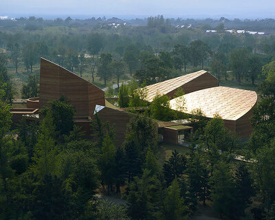 safdie architects plans cherokee heritage center as a cluster of earth-toned blocks