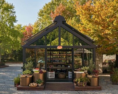 aluminum, timber, and bronze shape greenhouse retail space for culinary produce in madrid