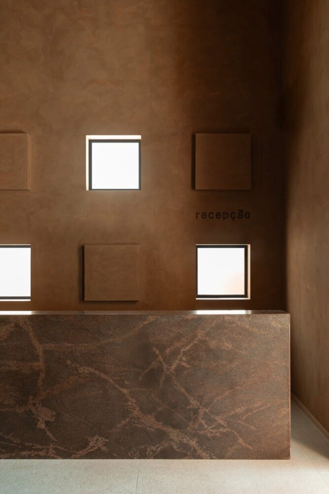 carefully framed openings establish visual connections across the site