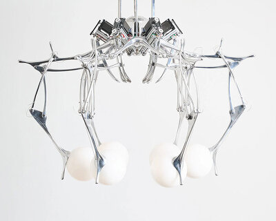 this chandelier behaves like a living machine inspired by 1950s computers