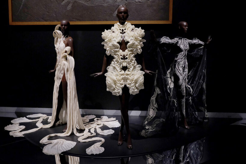 Cosmogonic Myth Gown, ‘Meta Morphism’ collection, 2022 (with Nicholas Koscinski) (left). Escapism Top and Skirt, ‘Escapism’ collection, 2011 (center), Aerology Jumpsuit, ‘Earthrise’ collection, 2021 (right), Iris Van Herpen Atelier