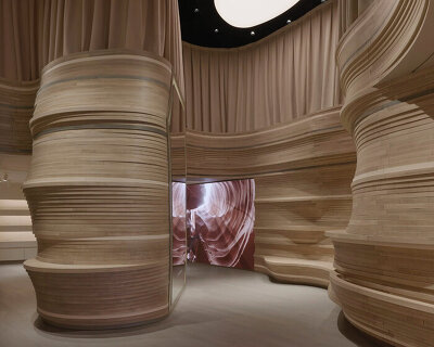 mirrored interiors and sculptural canyon-like forms shape skin1004’s soho flagship by LMTLS