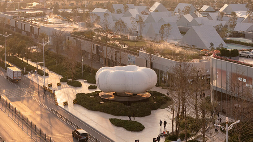 aerial view of the floating cloud installation positioned at the gateway to MIXC VILLAGE