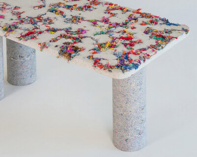 artificial stone produced from recycled textile waste composes furniture collection