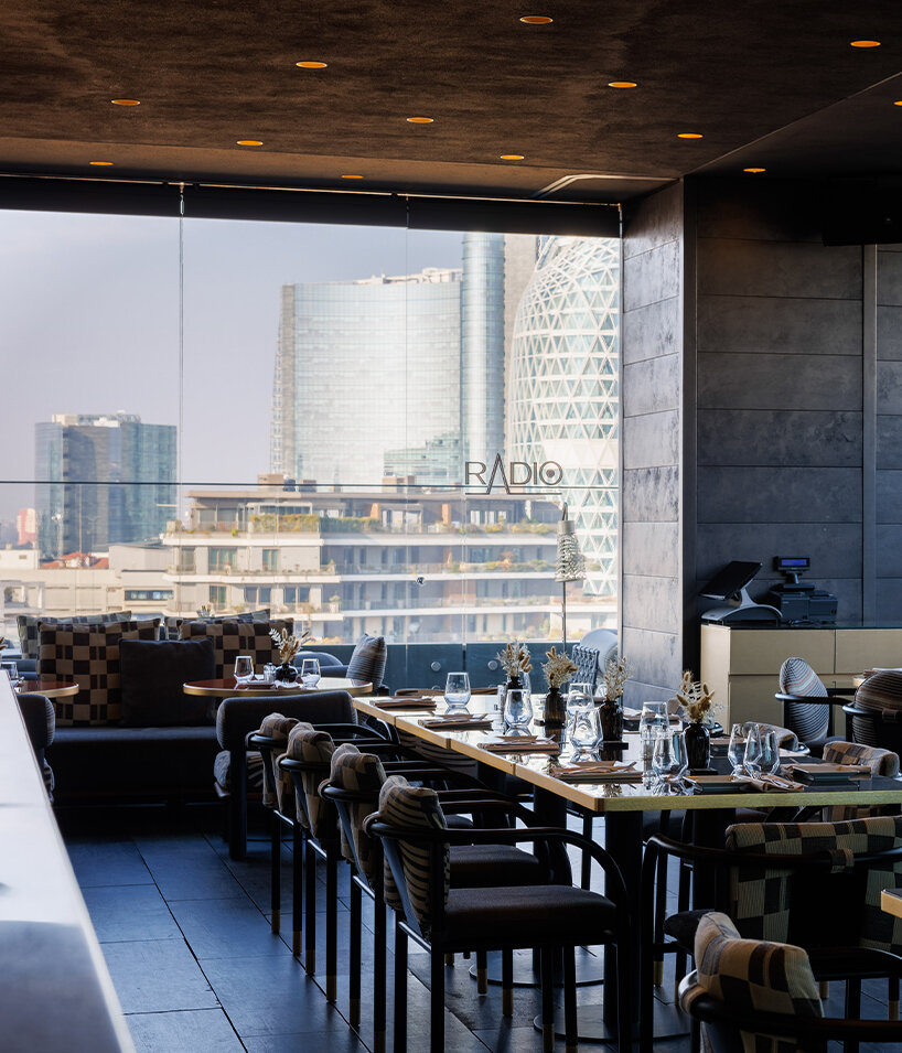 a cohesive design narrative connects the hotel's diverse spaces, from intimate private rooms to an understated dining area