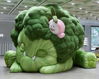 oversized vegetables and whimsical creatures fill gentle monster's veggie farm pop-ups