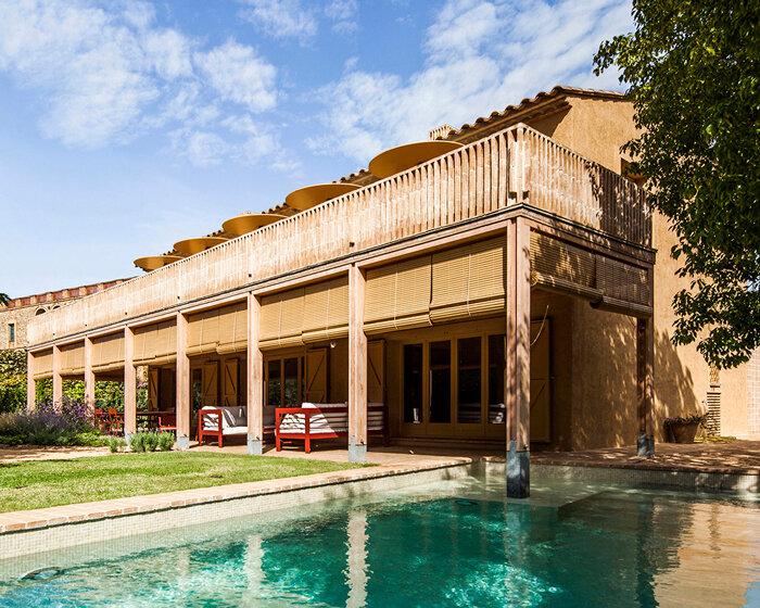anna & eugeni bach reframes house in fonolleres with wood and ochre ceramics