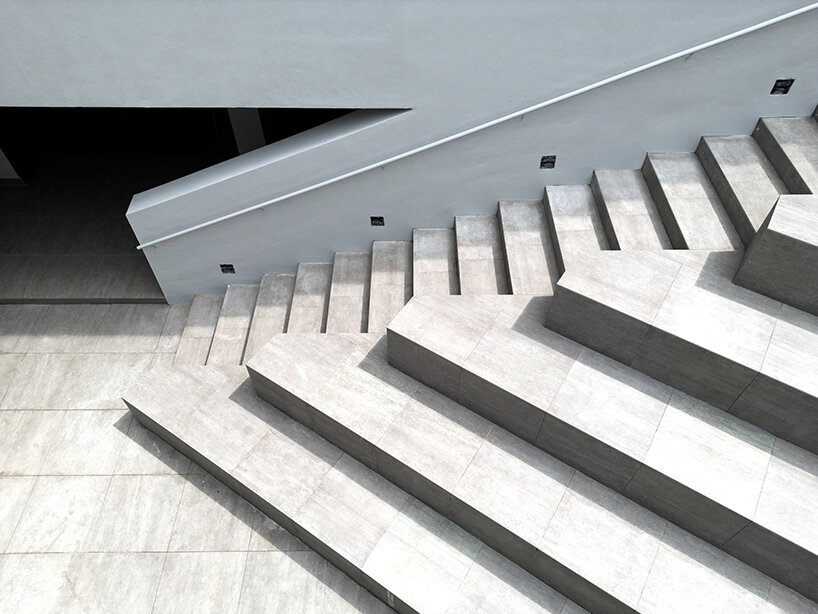 bold sculptural steps echo the brutalist language of the campus architecture