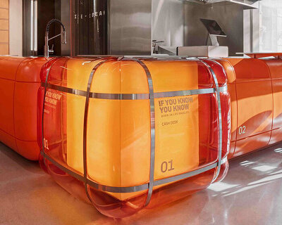 inflated orange volumes adorn smash burger restaurant’s interior by da bureau in armenia