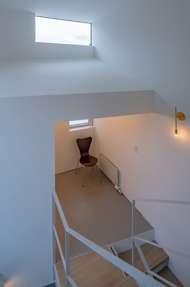 split-level spaces create visual connections while bringing daylight deep into the house