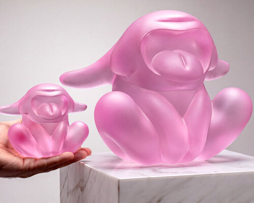 crystal animal sculptures freeze the open-mouthed gesture of a roar