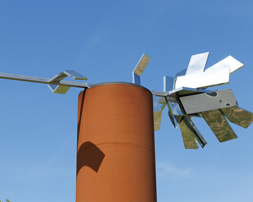 engraved soldiers’ names cover corten steel cylinder memorial in portugal