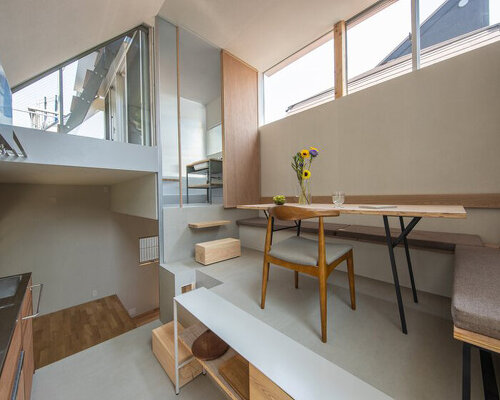 a spiral of timber beams and steel frames tiny 40-sqm tokyo home