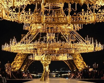 three monumental chandeliers recreate yves saint laurent’s historic paris ballroom at trocadéro