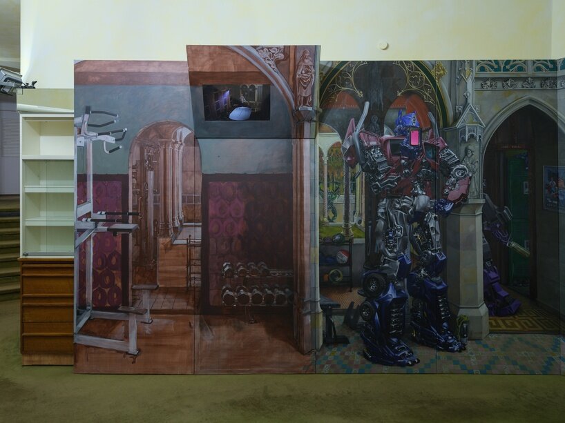 a mise-en-scène emerges of a strangely ornate historic building-turned gym that lead the way into a short animated film