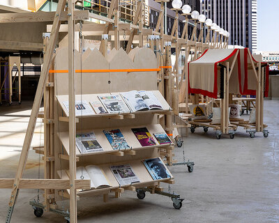 wood, ratchet straps, and metal joints shape mobile installations for design festival in denver