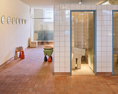 objects out of place: a collective art exhibition set inside former zurich washroom