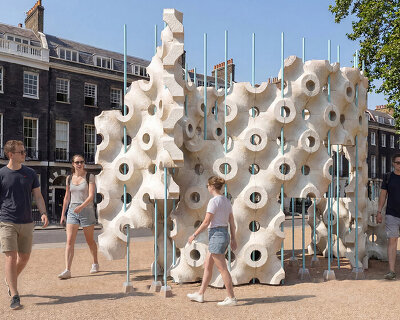 crafted from mycelium, hypha-lume pavilion maps human movement through light