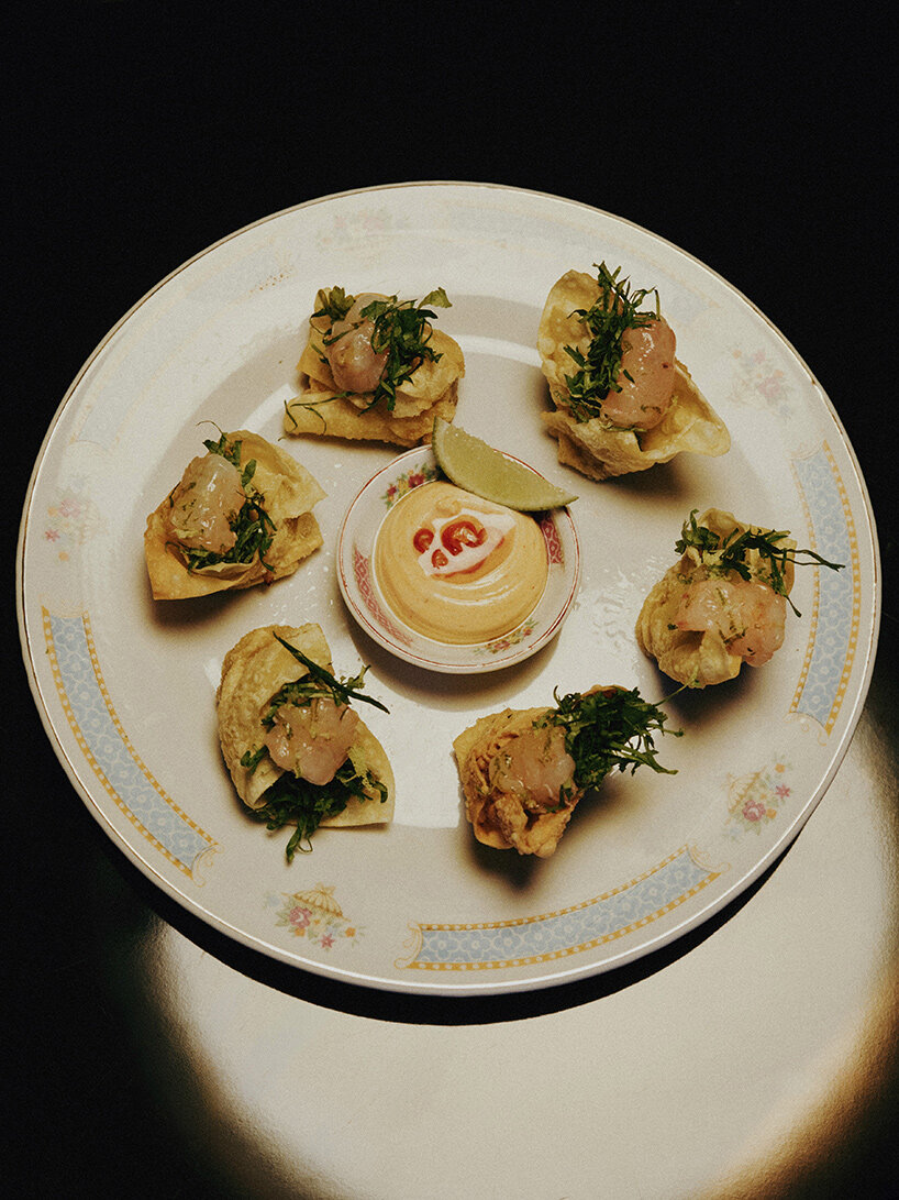 le poisson volant: red-lit restaurant in paris transforms into nightclub after dark - 2