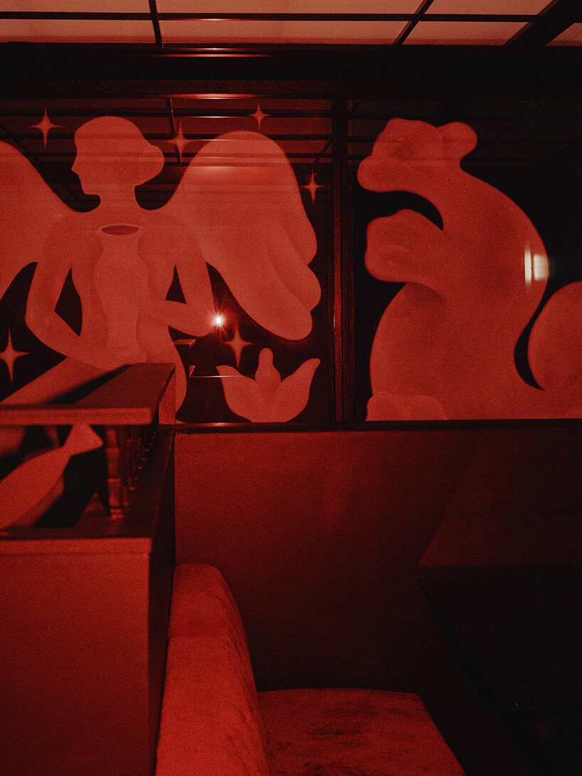 le poisson volant: red-lit restaurant in paris transforms into nightclub after dark - 6