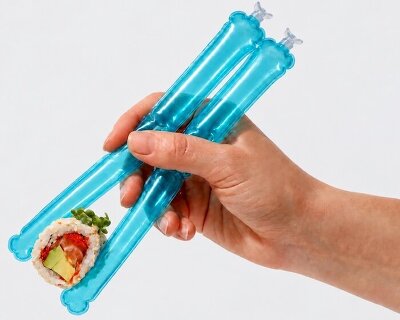 liam de la bedoyere's inflatable chopsticks roll up into your pocket between meals
