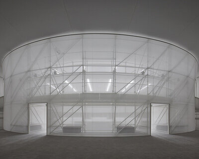 LOEWE’s paris runway occupies an ethereal arena by casper mueller kneer