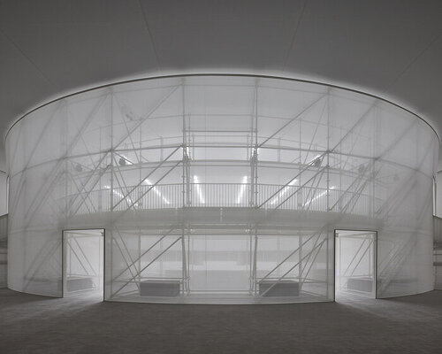 LOEWE’s paris runway occupies an ethereal arena by casper mueller kneer