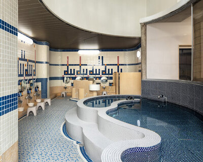 renewed 1983 bathhouse in japan preserves tilework and curved interiors