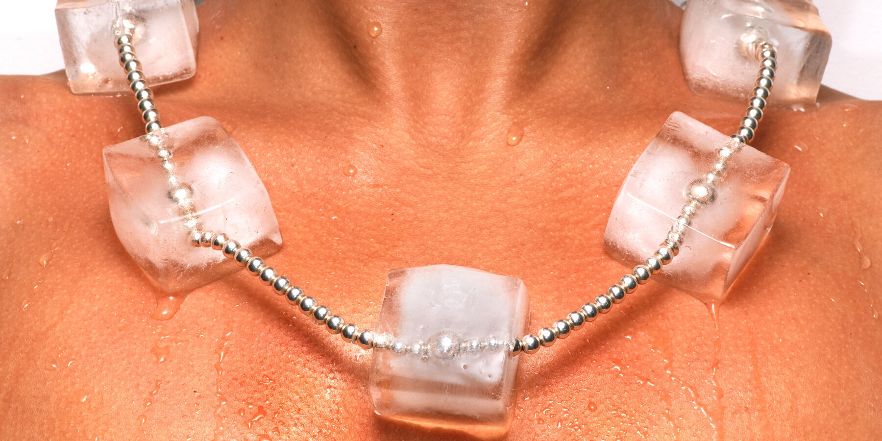 silver bead necklace comes with seven ice cubes that sweat, shrink and eventually vanish