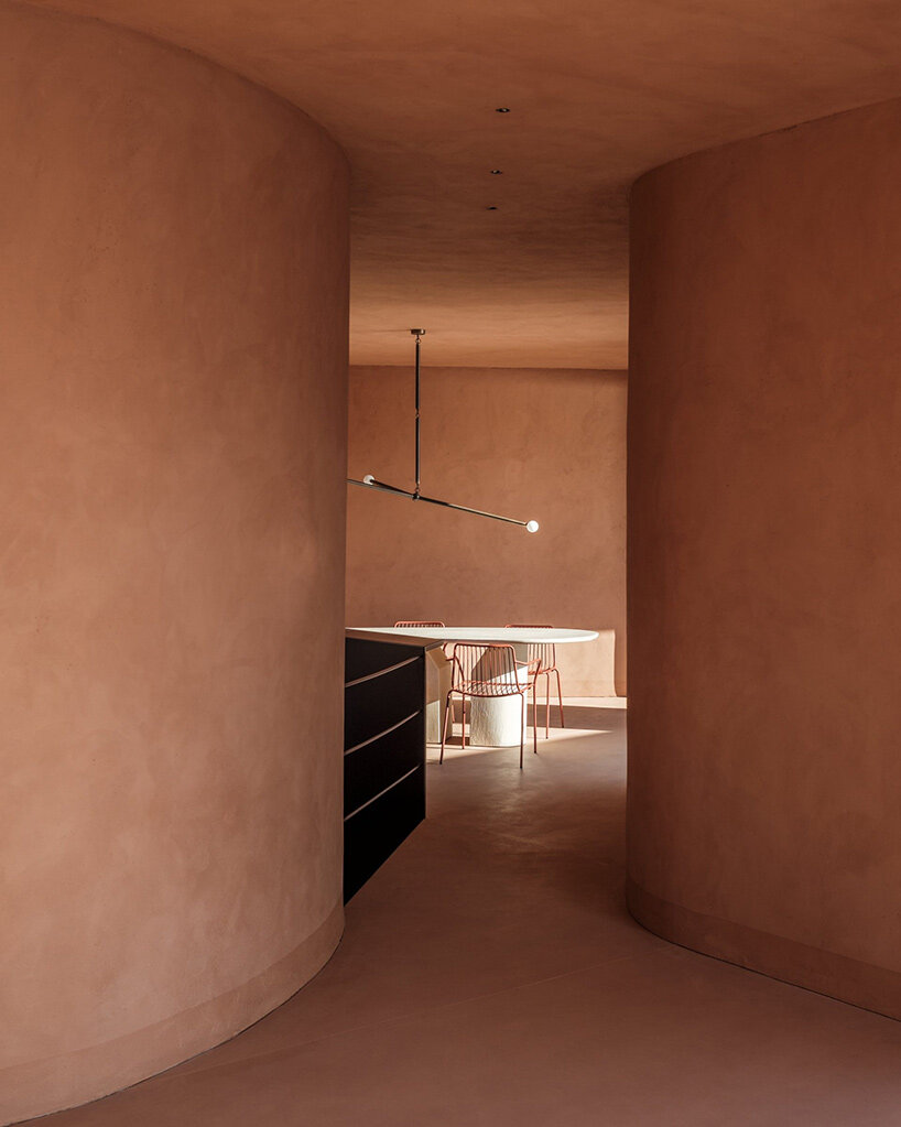 MOLD punctures terracotta-colored greek island ‘M residence’ with seven open-air courtyards - 3