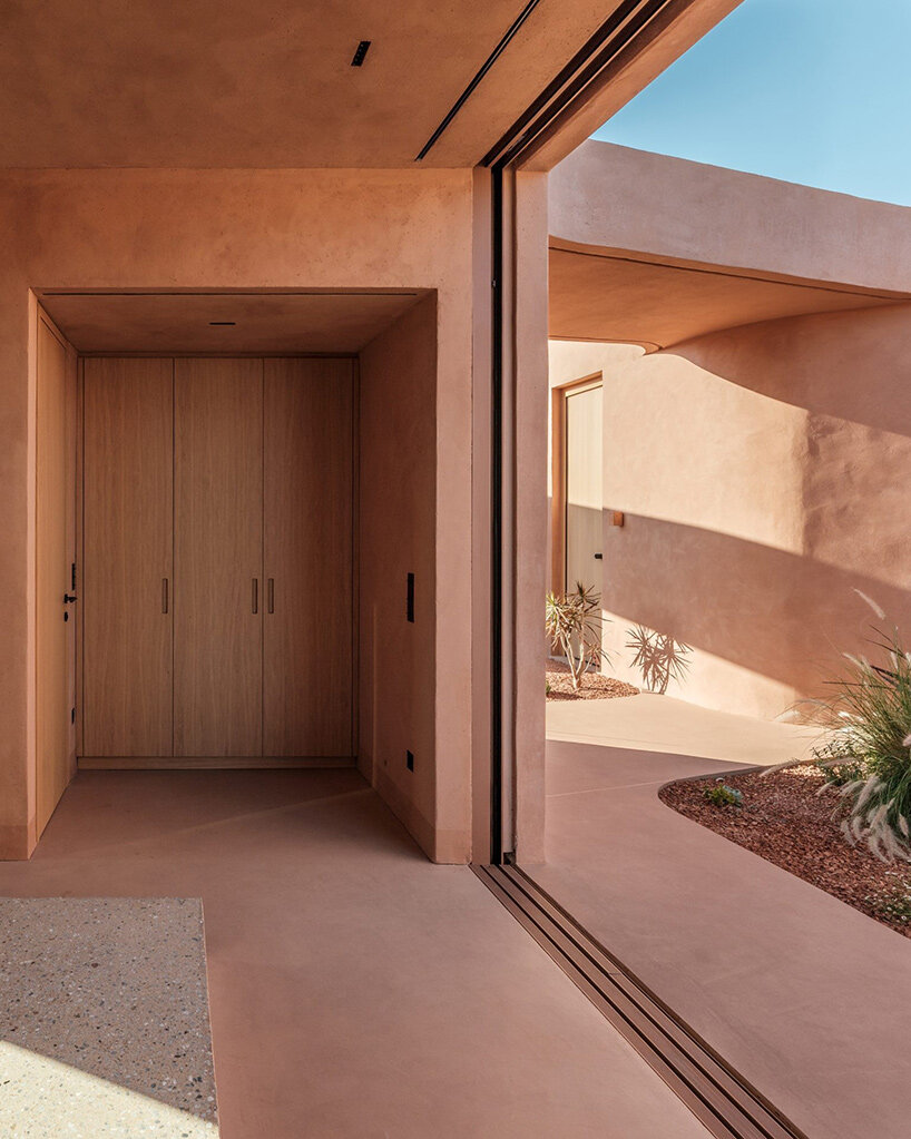 MOLD punctures terracotta-colored greek island ‘M residence’ with seven open-air courtyards - 5