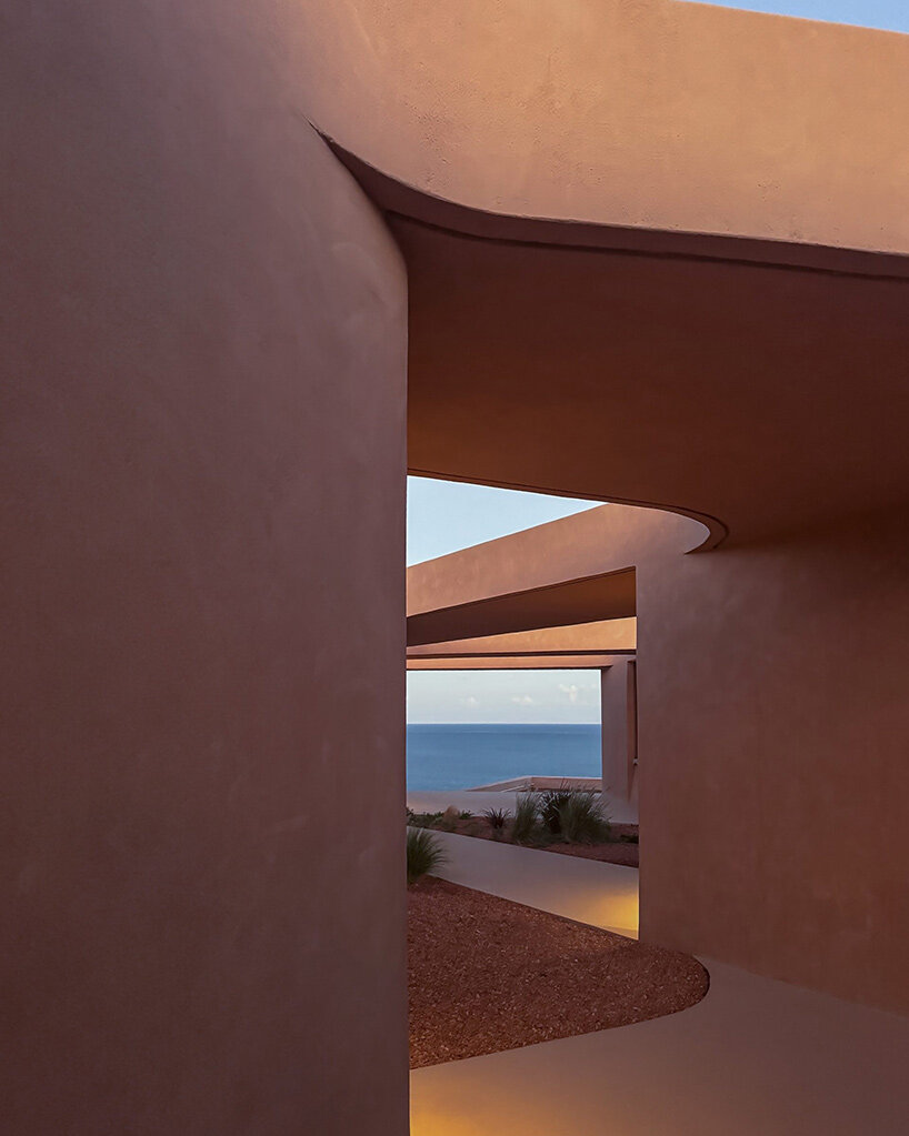 MOLD punctures terracotta-colored greek island ‘M residence’ with seven open-air courtyards - 6