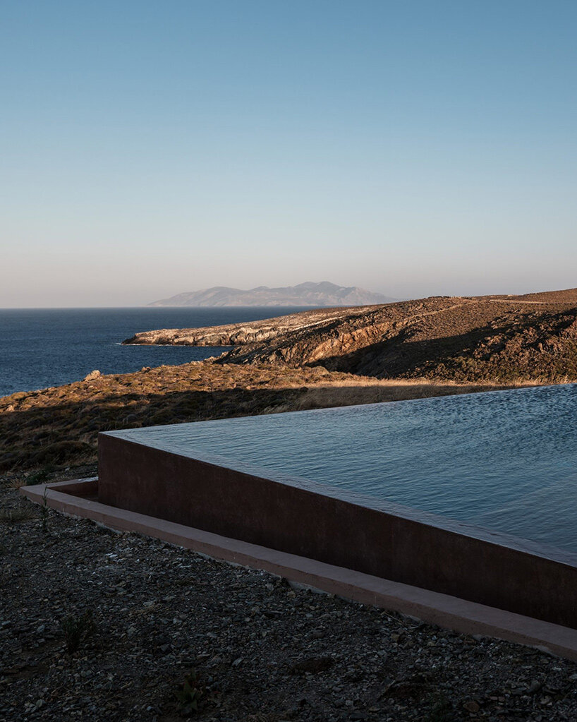 MOLD punctures terracotta-colored greek island ‘M residence’ with seven open-air courtyards - 10