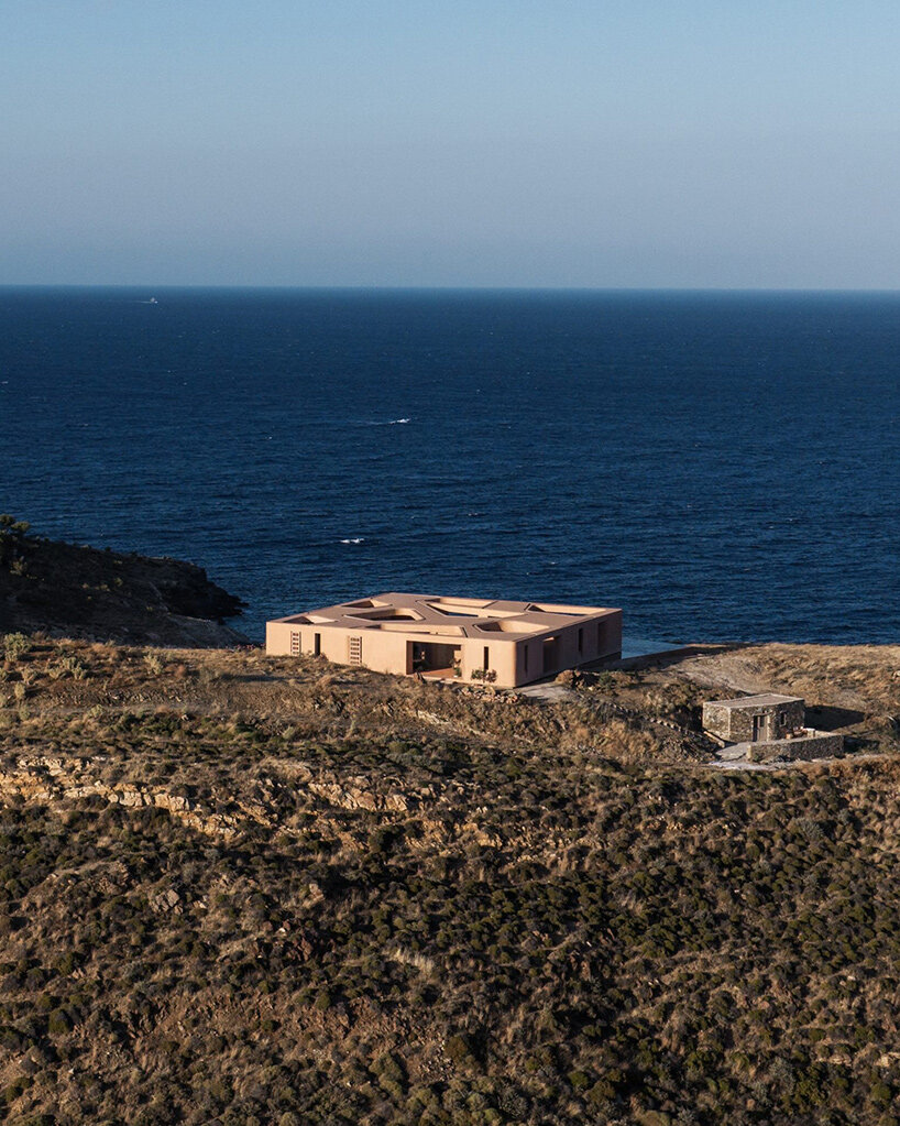 MOLD punctures terracotta-colored greek island ‘M residence’ with seven open-air courtyards - 13