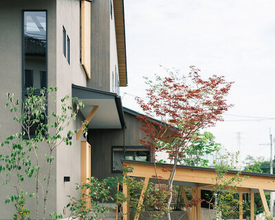 wood-framed family home in osaka revolves around flexible open sports space